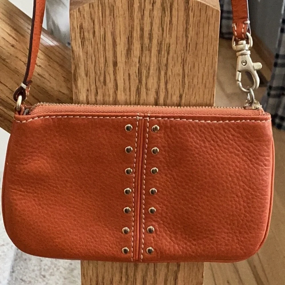 Michael Kors orange, gold tone Studded wristlet, clutch, zipper pouch